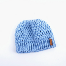 Load image into Gallery viewer, Europe and the United States new knit hat winter ladies horsetail hat autumn and winter earmuffs wool hat fashion labeling empty top hat
