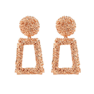 Metal earrings embossed floral earrings