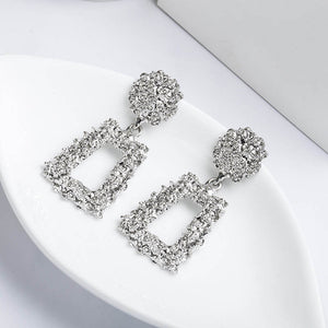 Metal earrings embossed floral earrings