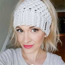 Load image into Gallery viewer, Europe and the United States new knit hat winter ladies horsetail hat autumn and winter earmuffs wool hat fashion labeling empty top hat
