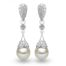 Load image into Gallery viewer, Long pearl earrings
