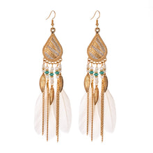 Load image into Gallery viewer, Feather earrings and pearl earrings
