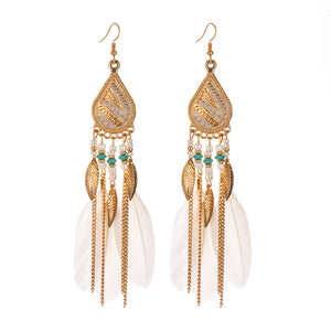 Feather earrings and pearl earrings