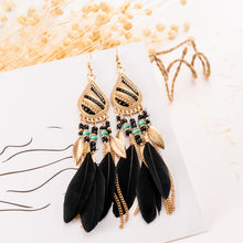 Load image into Gallery viewer, Feather earrings and pearl earrings
