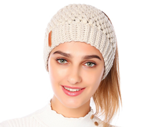 Load image into Gallery viewer, Europe and the United States new knit hat winter ladies horsetail hat autumn and winter earmuffs wool hat fashion labeling empty top hat
