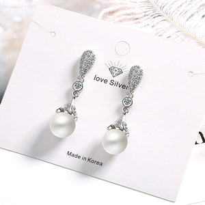 Long pearl earrings